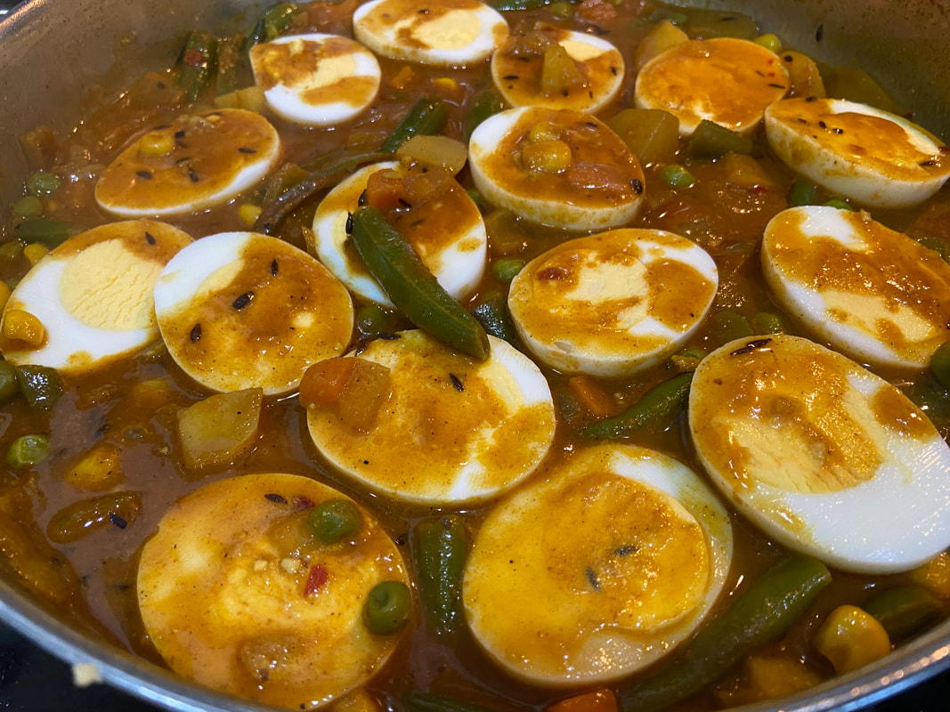 Madras curry eggs with vegetables