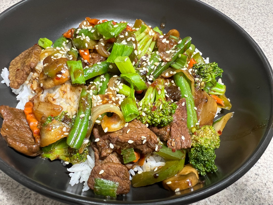 Stir-fry beef and vegetable rice bowl